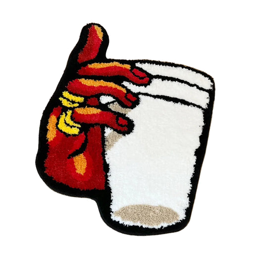 Holding Cup in Hand Tufted Rug